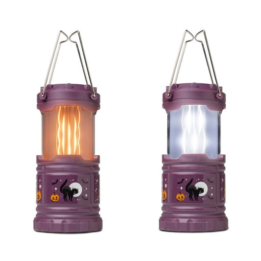 Halloween Pop-Up Lantern in purple with 2 different modes : LED white light or Flickering Flame sitting on white background. Little Gift Nook.