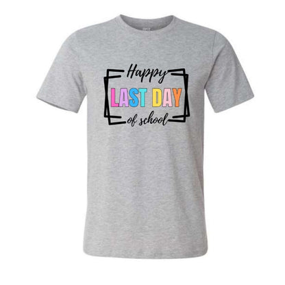 Gray t-shirt with Happy Last Day of School in colorful and black box text on front laying on a white background - Little Gift Nook