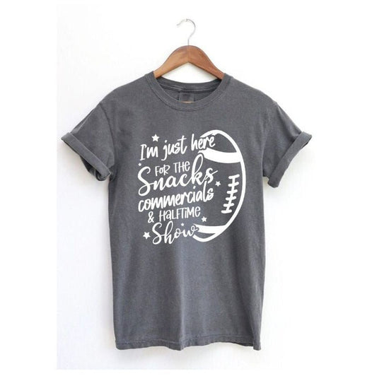 Gray short sleeve "Just here for the Snacks, Commercials, and Halftime" Tshirt. on white background. Little Gift Nook.