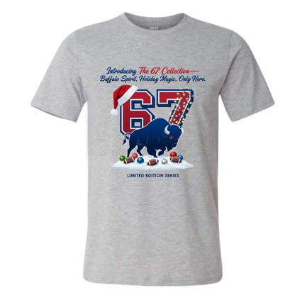 Gray t shirt with red blue 67 holiday Christmas lights and charging buffalo on front sitting on a white background. Little Gift Nook