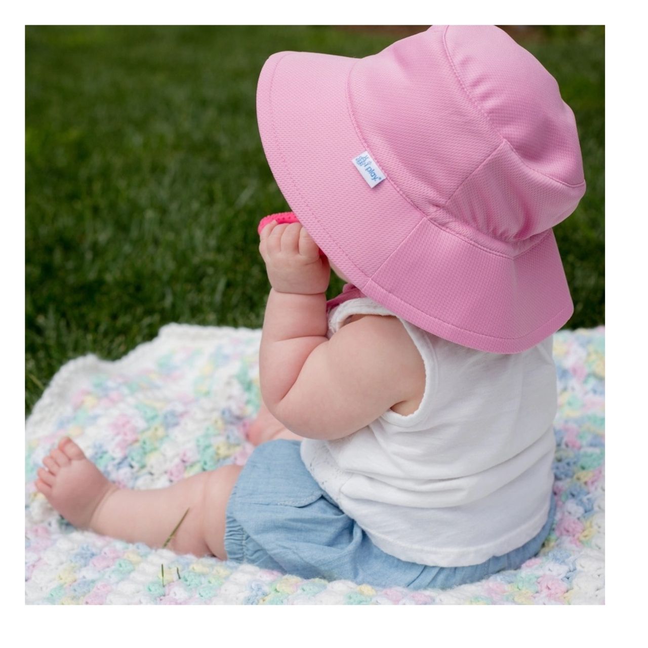 Baby wearing iPlay Pink Breathable Baby Toddler Bucket Sun Hat.  Large rim. UPF 50+. baby and toddler sizes. - Little Gift Nook