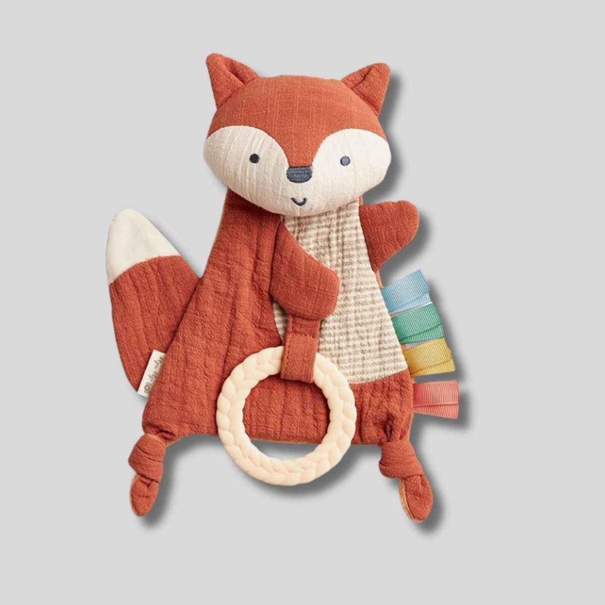 Itzy Ritzy orange fox crinkle plush teether toy on gray background.