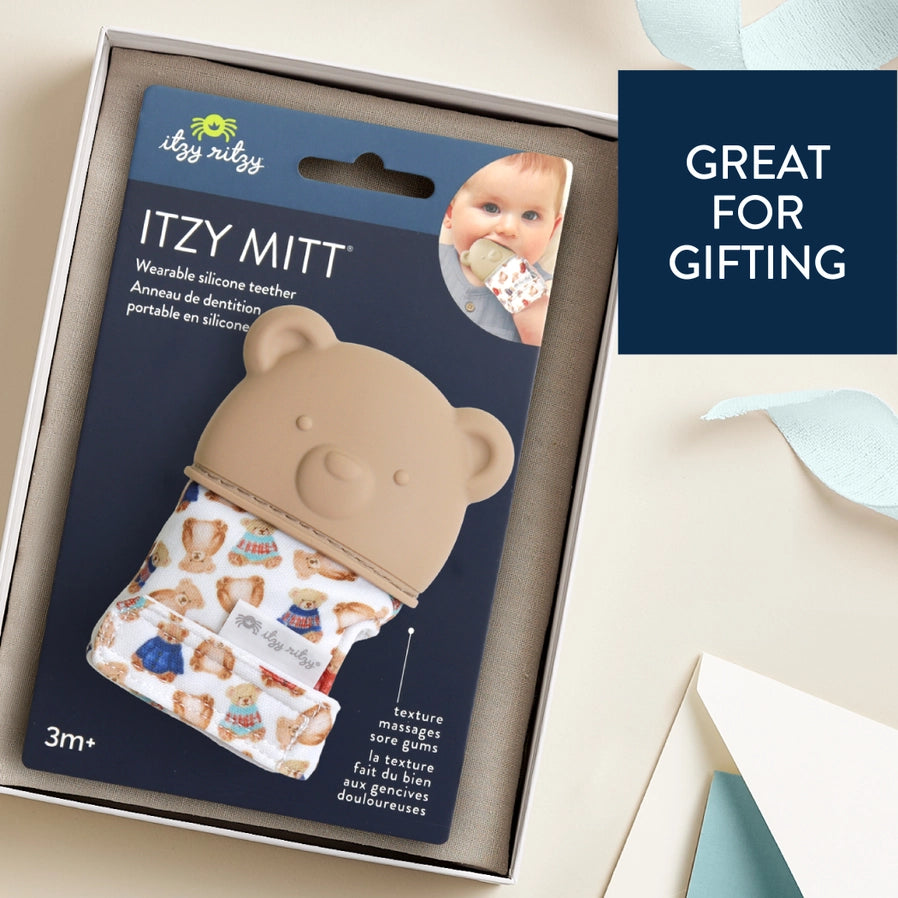 Itzy Ritzy baby silicone bear teething mitt in packaging and gift box.