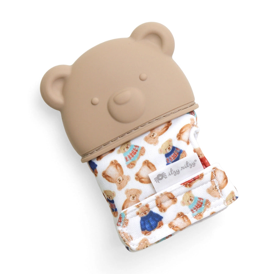 Tan teddy bear theme baby teething mitt laying on white background tilted.