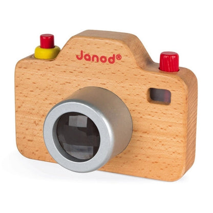 Wooden toy camera from Janod without orange case on white background.