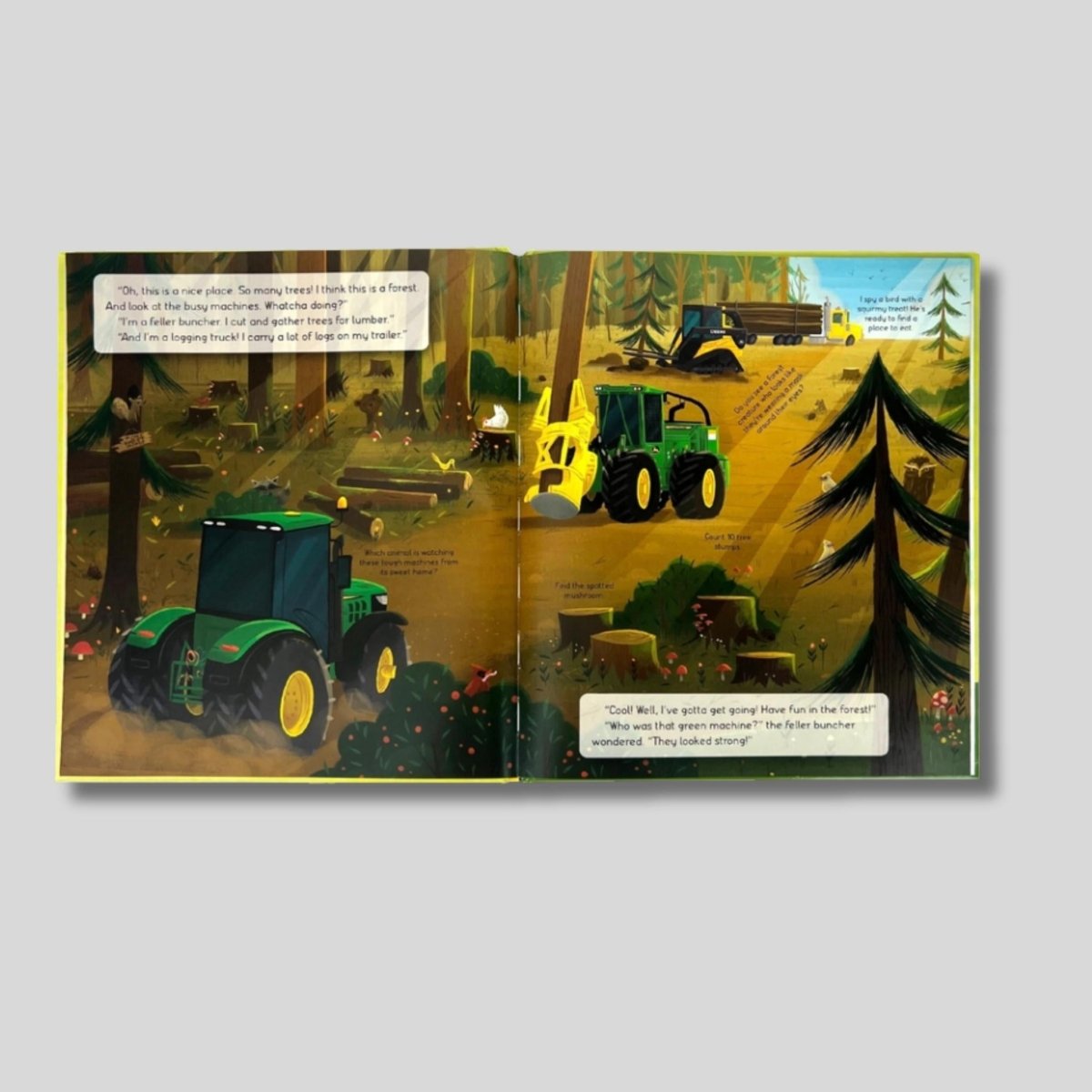 John Deere Farm Kids I Spy book inside pages with tractors and key items to find. 
