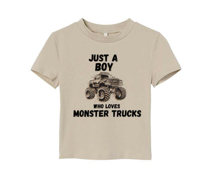 Beige t-shirt with black text and monster truck graphic. "Just a boy who loves Monster Trucks".