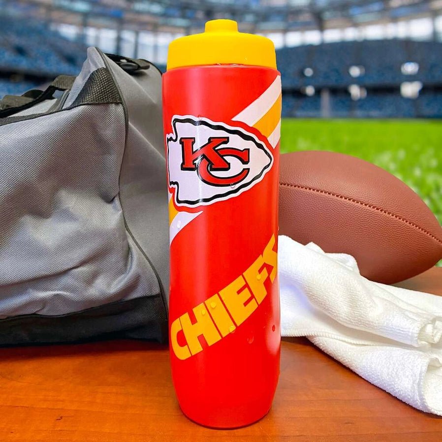 Kansas City Chiefs logo 32oz BPA Free squeezy water Bottle on a football field background.