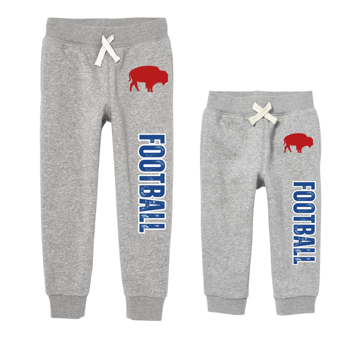 Two pairs of heather gray kids sweatpants shown side by side, both with white drawstrings, a red buffalo graphic on the upper right leg, and vertical blue 'FOOTBALL' text along the leg.