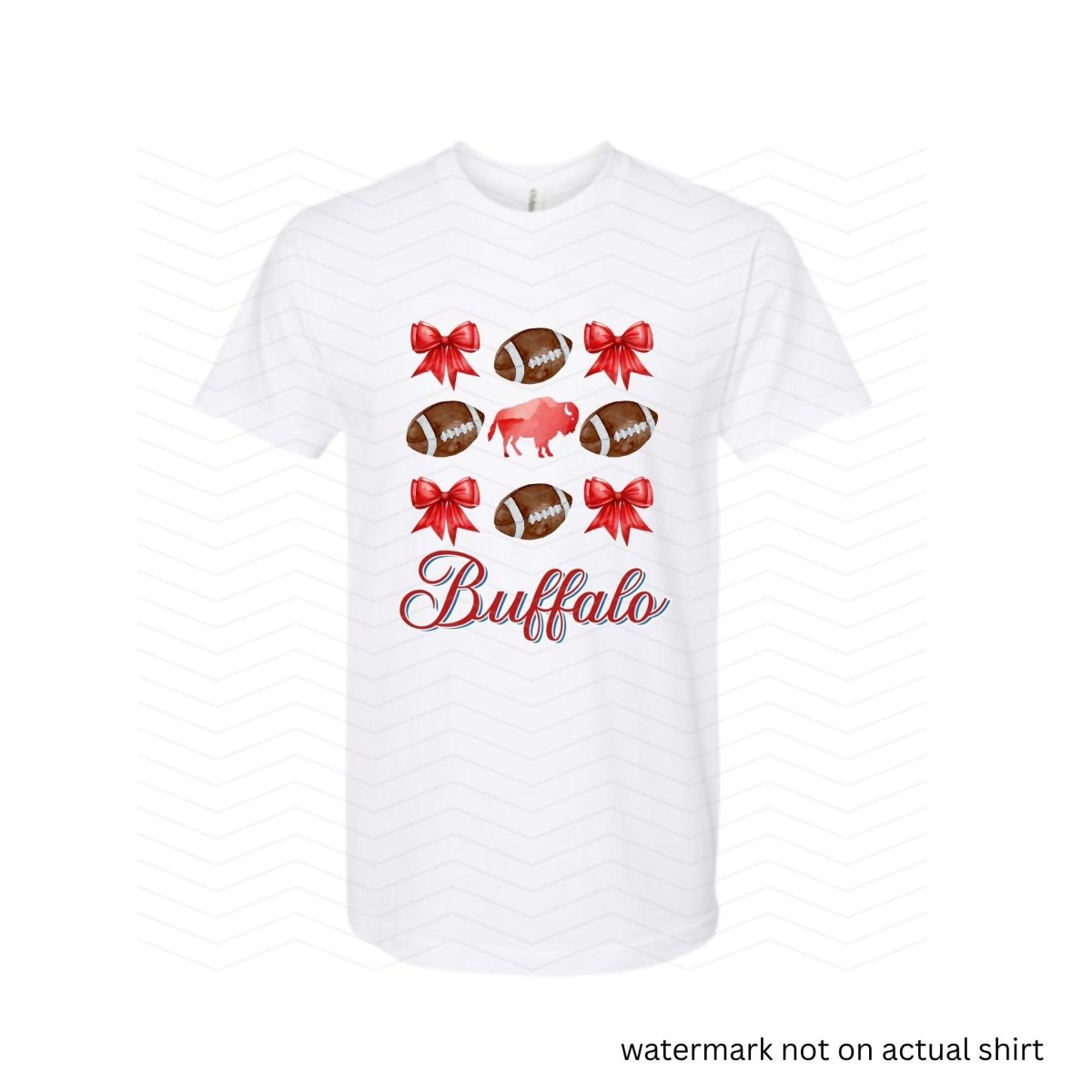 white tshirt with red bows, buffalo, and brown footballs with the text Buffalo in cursive red below image on front.