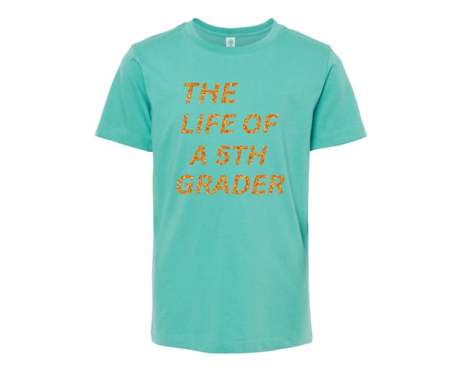 Seafoam Teal Green youth tshirt with orange glitter "Life of a 5th Grader" Tshirt on white background.