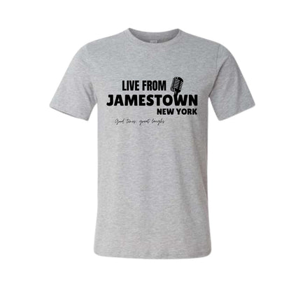 Heather gray "LIVE FROM JAMESTOWN NEW YORK" "Good times, great laughs" t-shirt in black text with retro microphone image on front. T-shirt sitting on white background. 