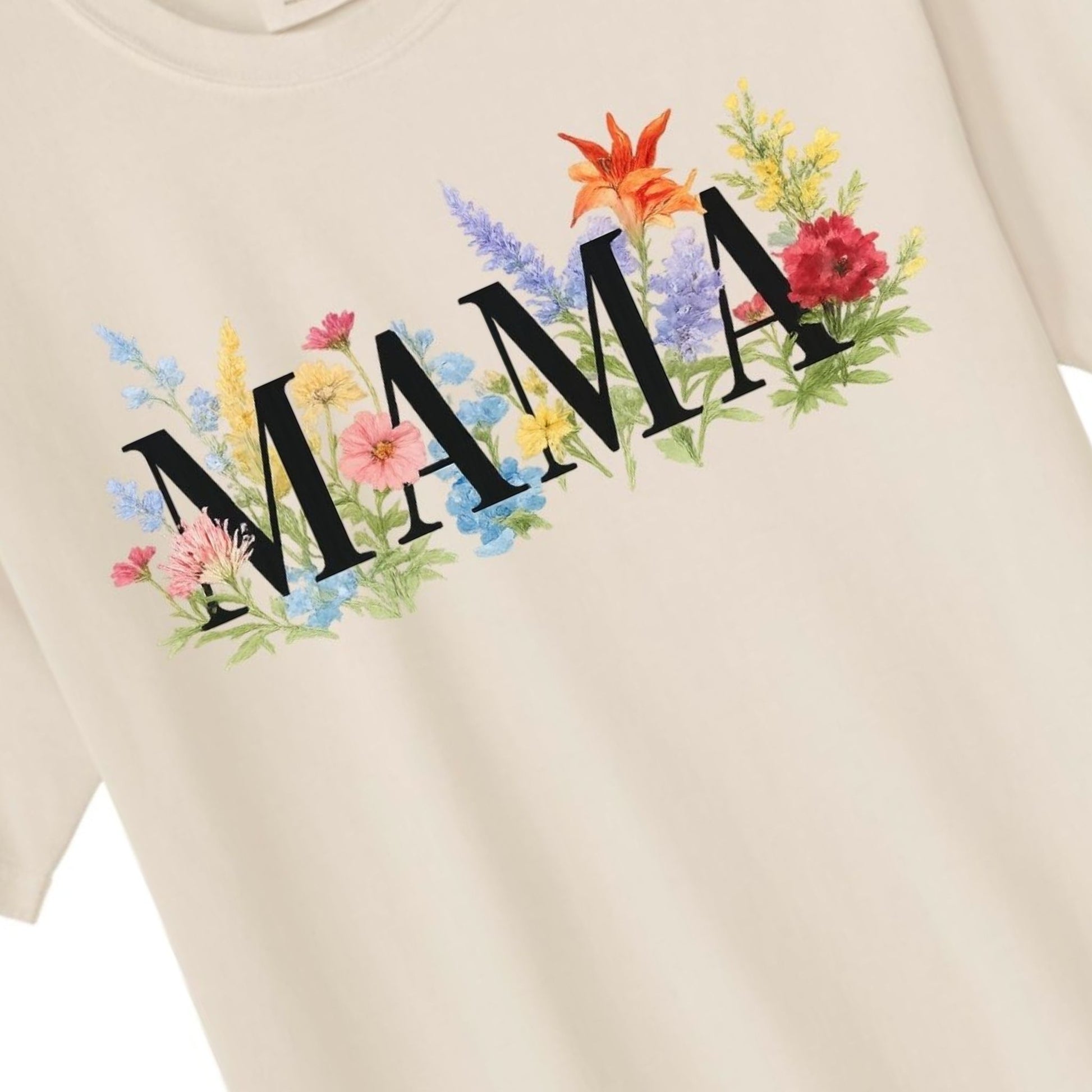 Close up of beige MAMA floral tshirt.