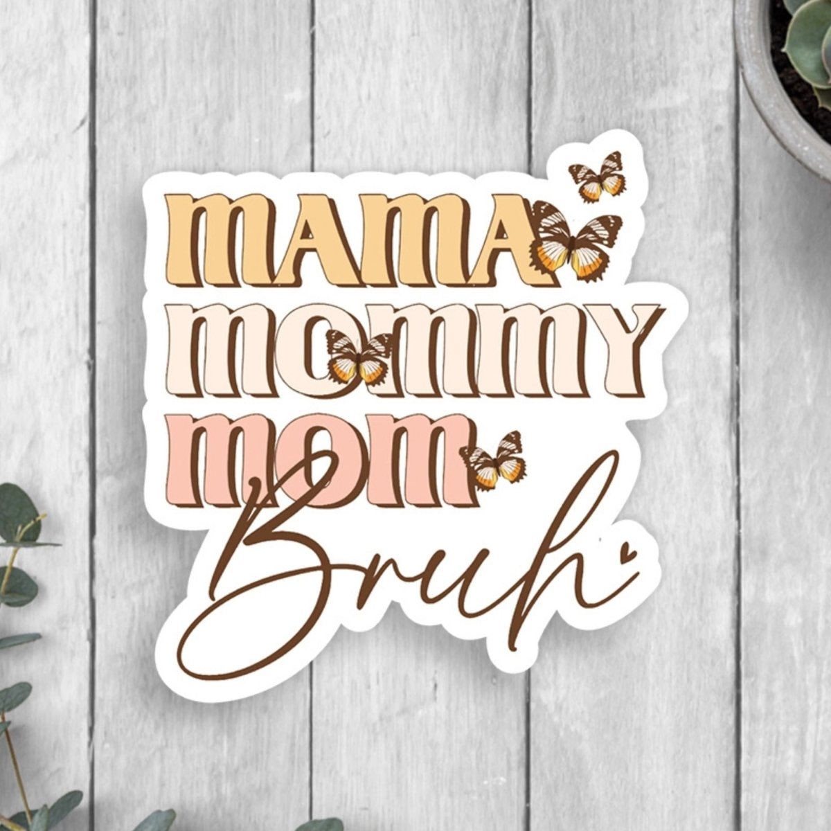 white yellow and pink waterproof mama mommy mom bruh with butterflies sticker on wood background. Little Gift Nook