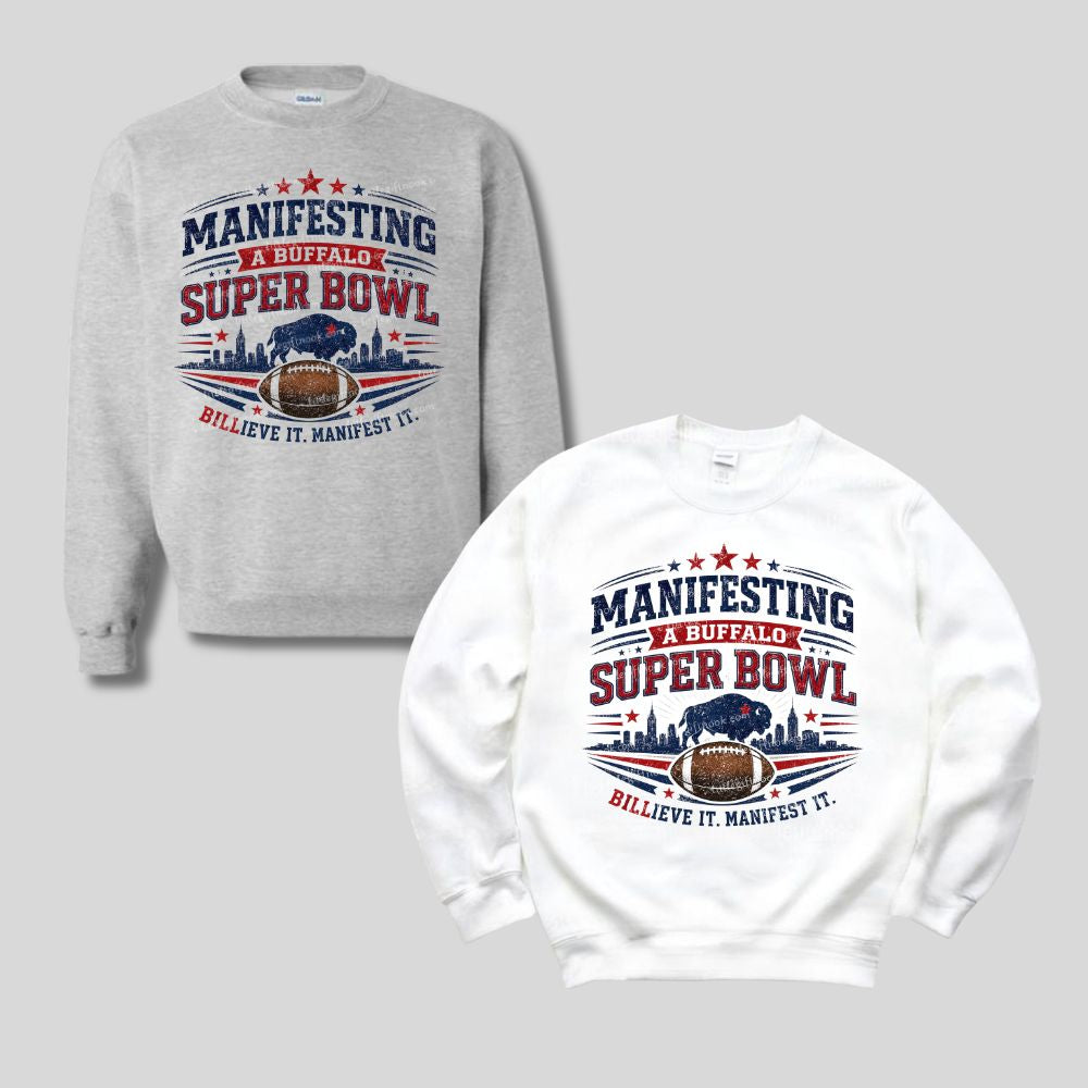 Gray and white sweatshirts with red and blue "Manifesting a Buffalo Super Bowl Billieve it manifest it" design on fronts on a light gray background.