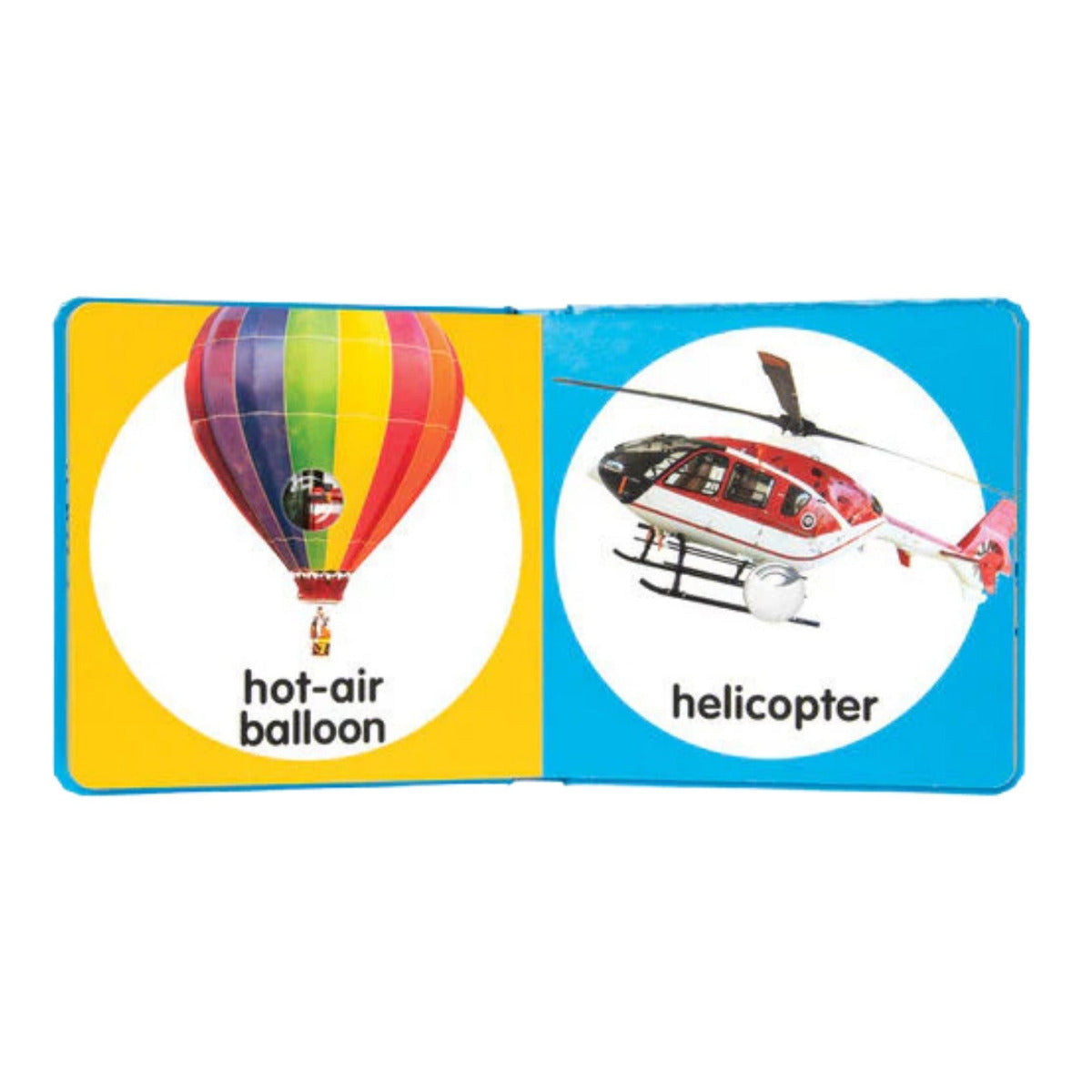 Poke a dot Things that Go board book inside book pages with hot air balloon and helicopter and plastic bubbles to pop open on a white background.