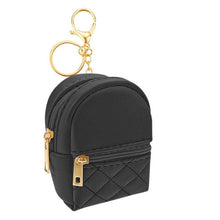 Load image into Gallery viewer, Black Quilted mini backpack keychain. Has 2 pockets that open with gold zippers and gold keyring, chain, and lobster clip. Measures 3.94 inches tall. Little Gift Nook.