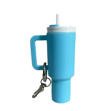 Load image into Gallery viewer, Mini Keychain Tumblers. Lid screws off. Holds chapstick or small items. Light Blue color.  Metal keyring and lobster clip. Little Gift Nook.