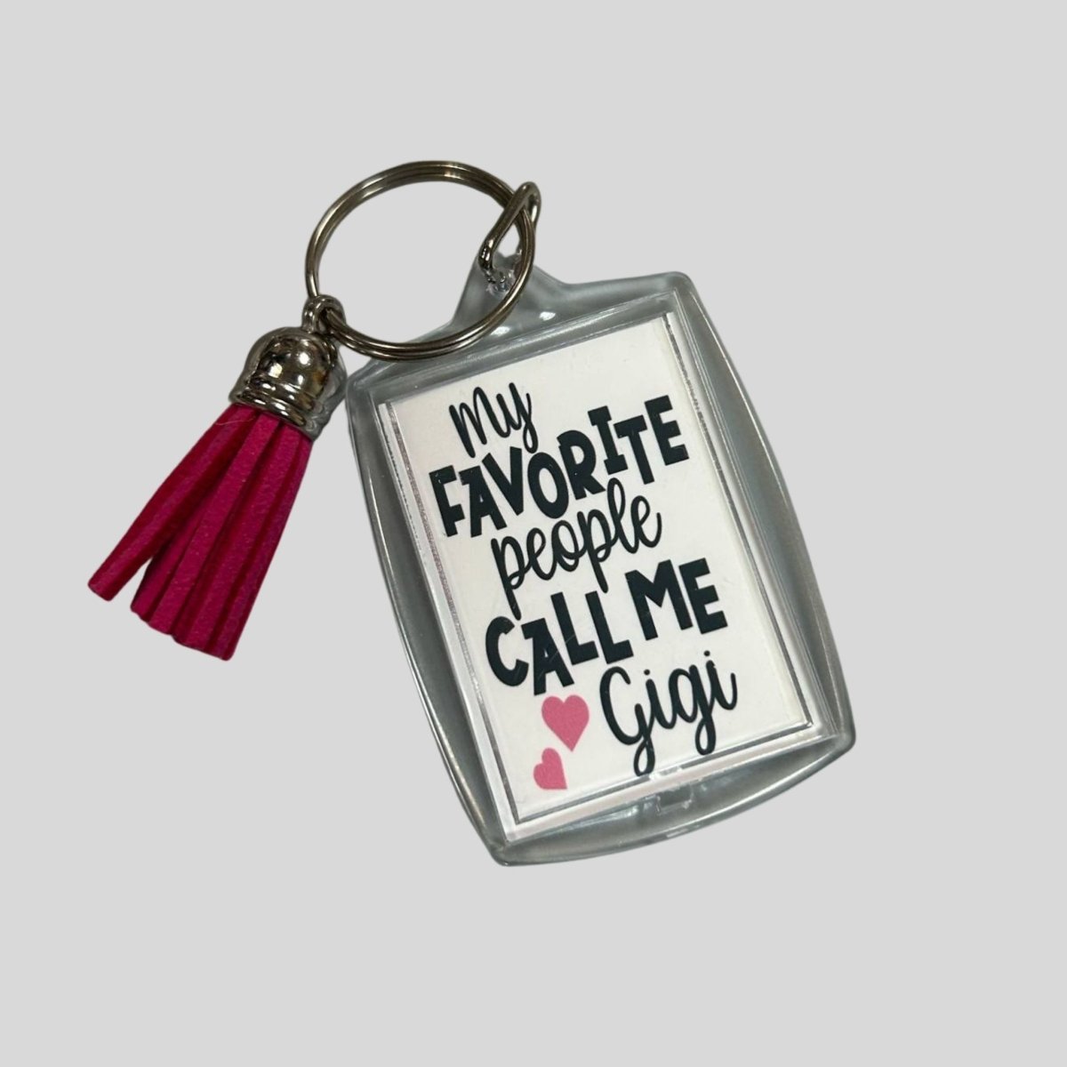 Gigi Grandma Keychain. 2" clear rectangle keychain with image on both sides. Pink tassel. My favorite people call me Gigi" - Little Gift Nook