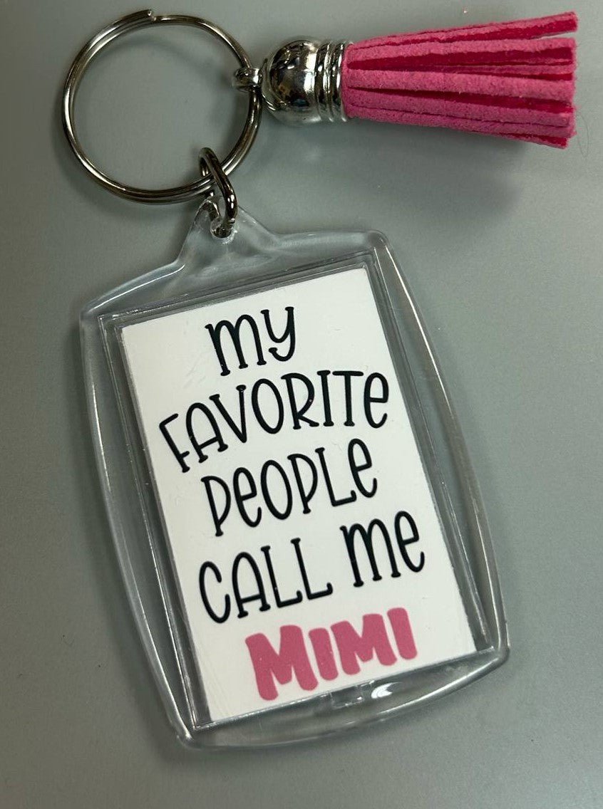 Keychain with 'My Favorite People Call Me Mimi' text on a white background