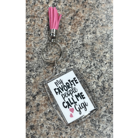 Gigi Grandma Keychain. 2" clear rectangle keychain with image on both sides. Pink tassel. My favorite people call me Gigi" - Little Gift Nook