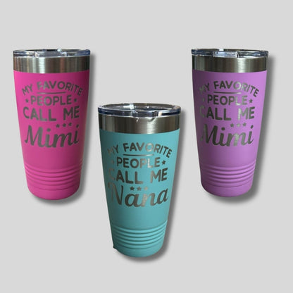Three tumblers with engraved text "my favorite people call me mimi or nana" on a light gray background