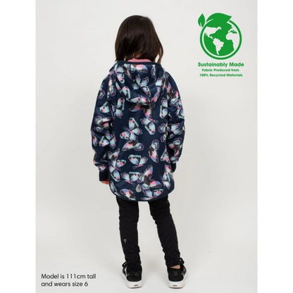 Little girl wearing navy, pink, blue butterfly print lined Waterproof Raincoat back view. 