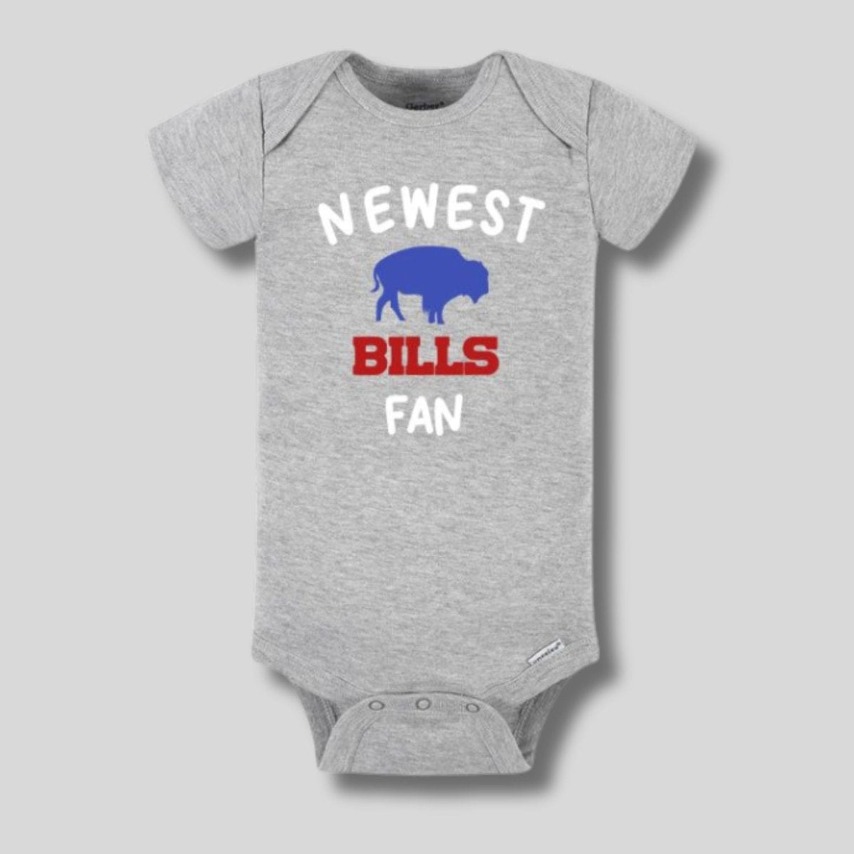Gray short sleeve baby bodysuit with "Newest BILLS fan" on front and blue buffalo silhouette laying on a light gray background.