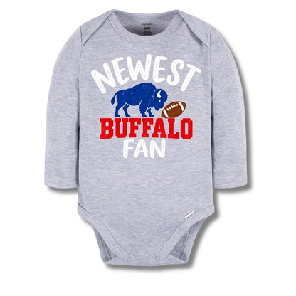 A heather gray long-sleeve baby bodysuit with the text 'NEWEST BUFFALO FAN' in white and red, alongside a blue buffalo and a brown football.