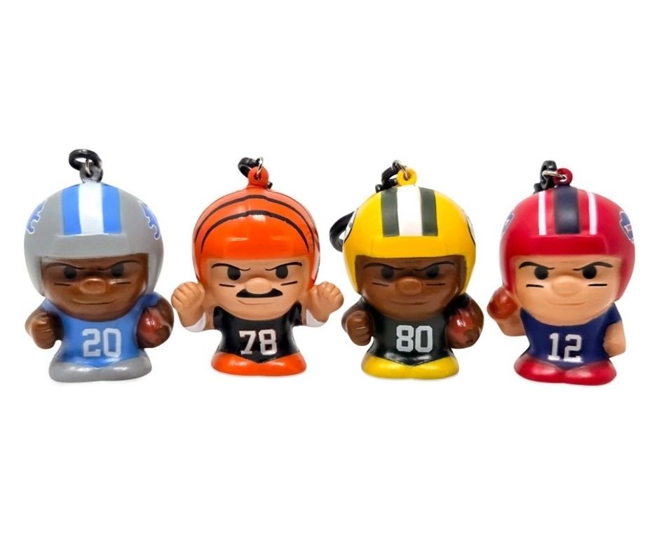 NFL 2026 SqueezyMates legends 4 possible collectible players from mystery bags standing on white background. 