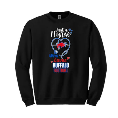 A black crewneck sweatshirt featuring a graphic print on the front with the text 'Just a Nurse Who Loves BUFFALO FOOTBALL' in white, blue, and red, accompanied by a heart and stethoscope design.