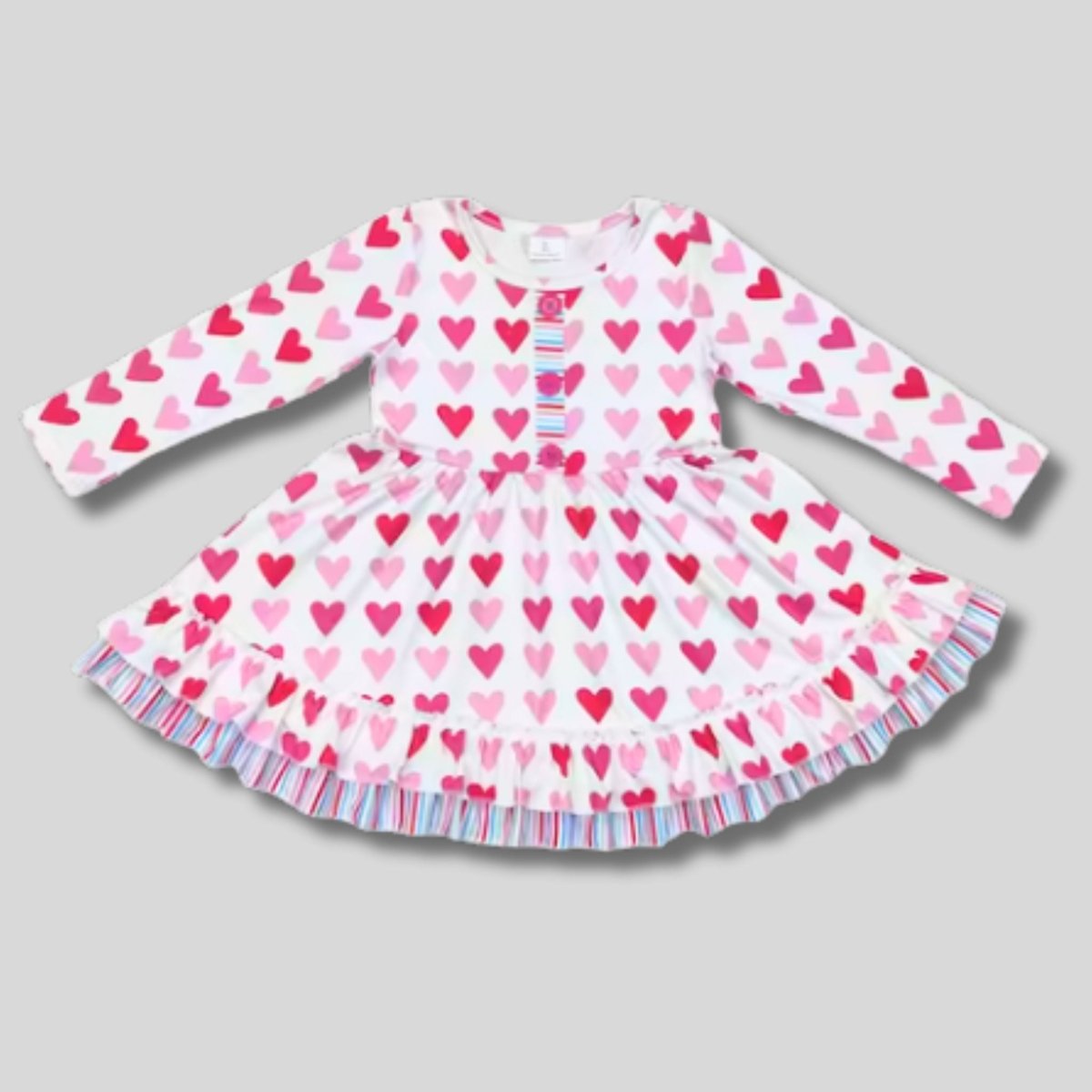 Pink Blue Hearts Ruffle Twirl Dress.  Dress with pink heart background.  Cotton/Spandex blend 2 pink heart print dress with blue striped accents & ruffle hem.  Pull on/ off.  Buttery soft & Stretchy.  Little Gift Nook.