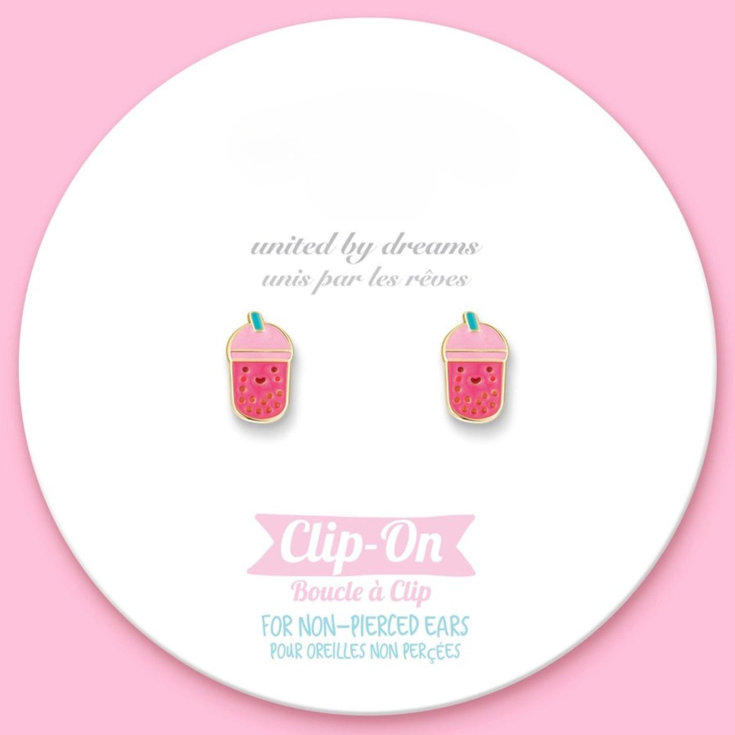 Clip-on earrings with pink and blue boab tea design on a white circular card with text.
