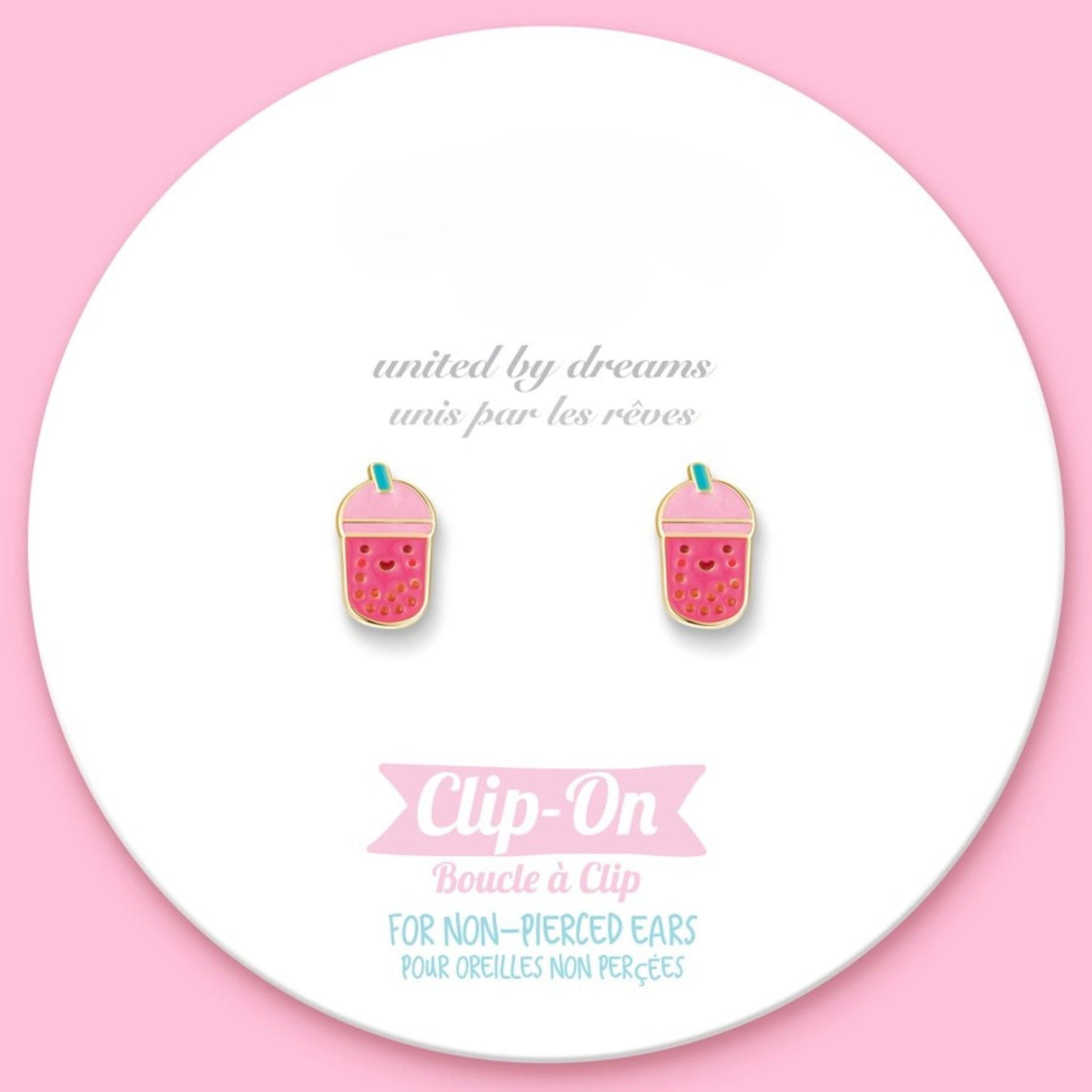 Clip-on earrings with pink and blue boab tea design on a white circular card with text.