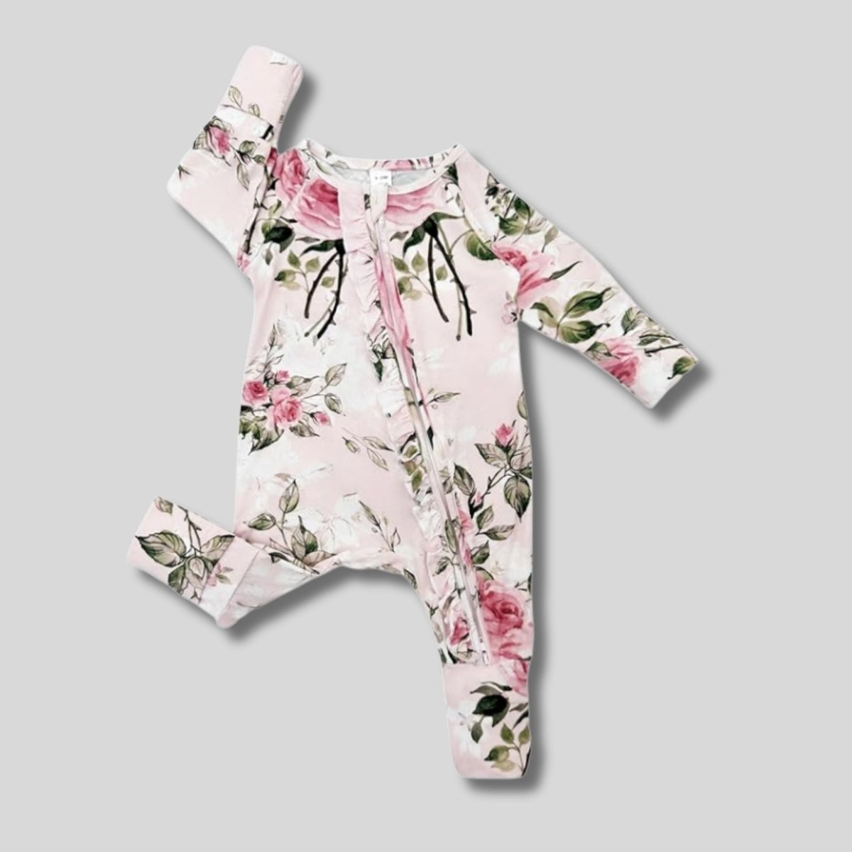 pink floral ruffle bamboo baby sleeper with fold over feet and hands.