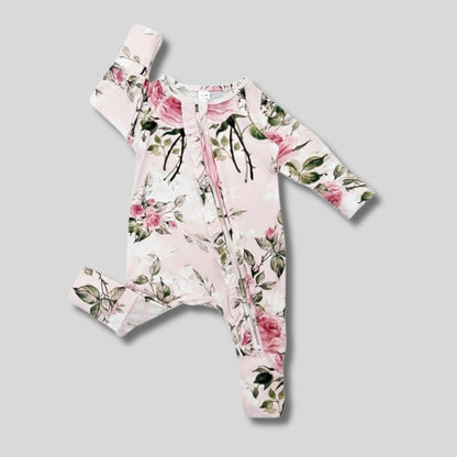 pink floral ruffle bamboo baby sleeper with fold over feet and hands.