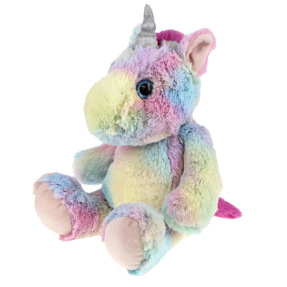 Plush rainbow unicorn sitting on white background with sparkle silver horn and pink hair.
