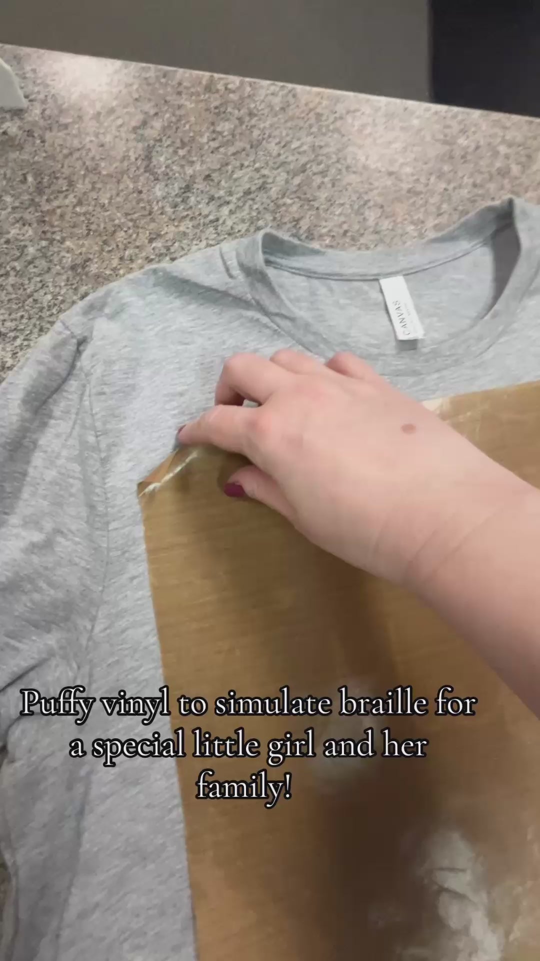 Video of custom t-shirt with puffy vinyl to simulate "braille" lettering on a shirt for a customer request at the Little Gift Nook Jamestown, NY 