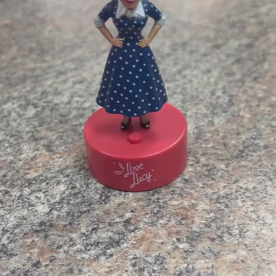 Video of Lucille Ball talking mini bobble head figure sitting on countertop in the Little Gift Nook shop.