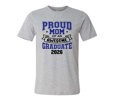 Gray tshirt with blue and black text "Proud MOM of an awesome graduate 2026" sitting on a white background. Little Gift Nook