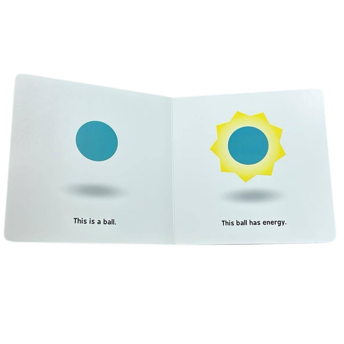 Children's book "Quantum Physics for babies" with two pages showing a blue circle labeled 'This is a ball.' and a yellow circle with energy rays labeled 'This ball has energy.