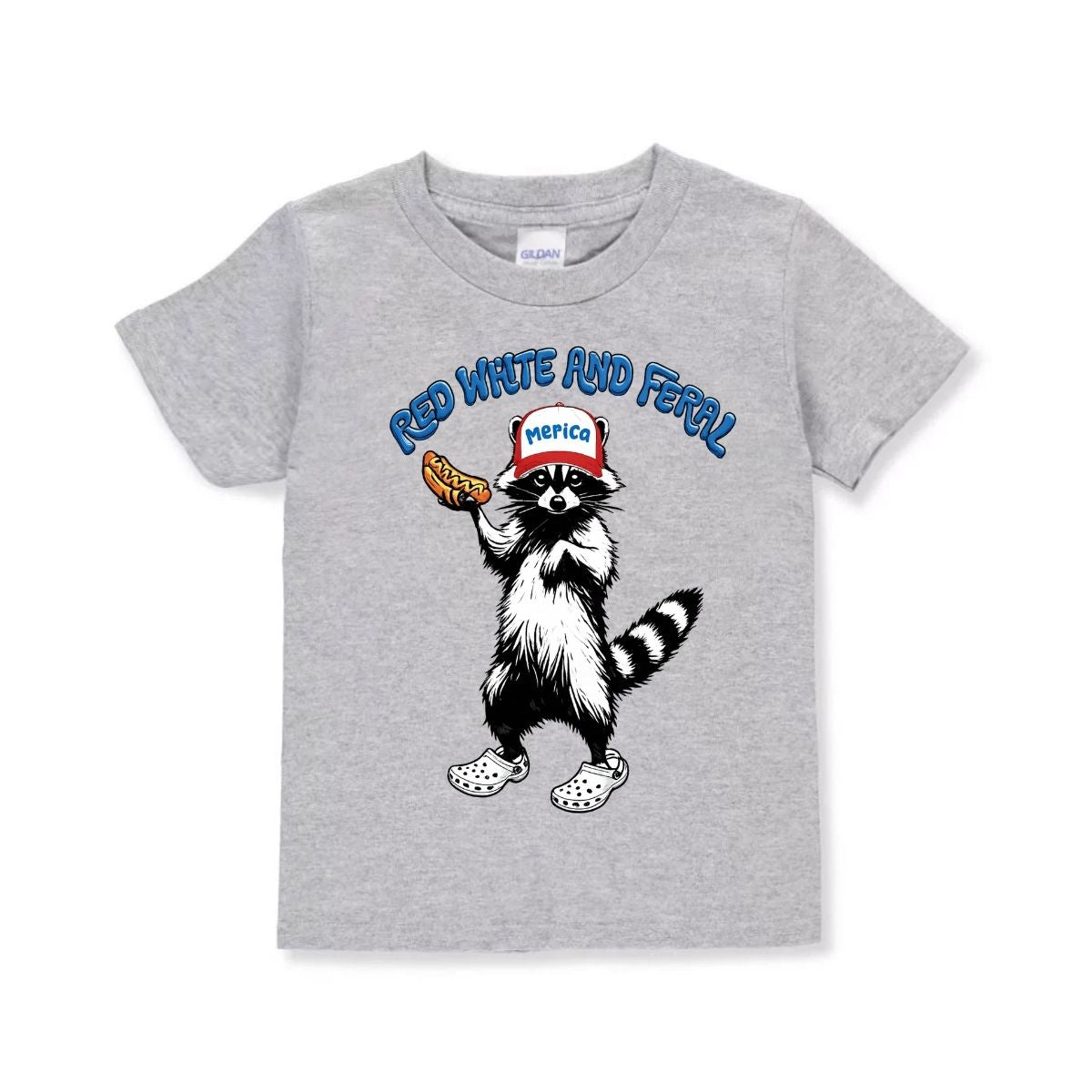 Heather gray toddler 4th of July tshirt "Red, white, and Farel" raccoon holding hot dog in crocs with hat that says "Merica" sitting on white background.