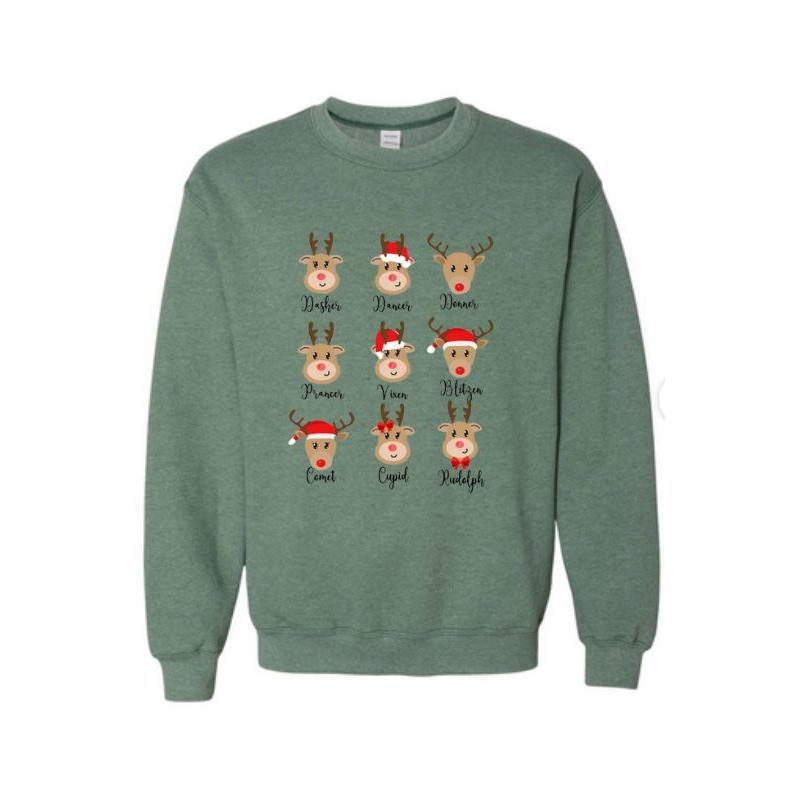 Reindeer Holiday Green Crewneck Sweatshirt. Soft forest green color.  Fleece lined. Reindeer faces on front with their names under. Little Gift Nook.