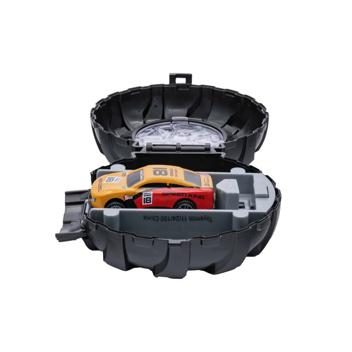 Rollin' Launch ‘N Race car launcher toy. Plastic black tire toy that opens and has 1 matchbox style car inside. Launcher button to send car shooting out. - Little Gift Nook.