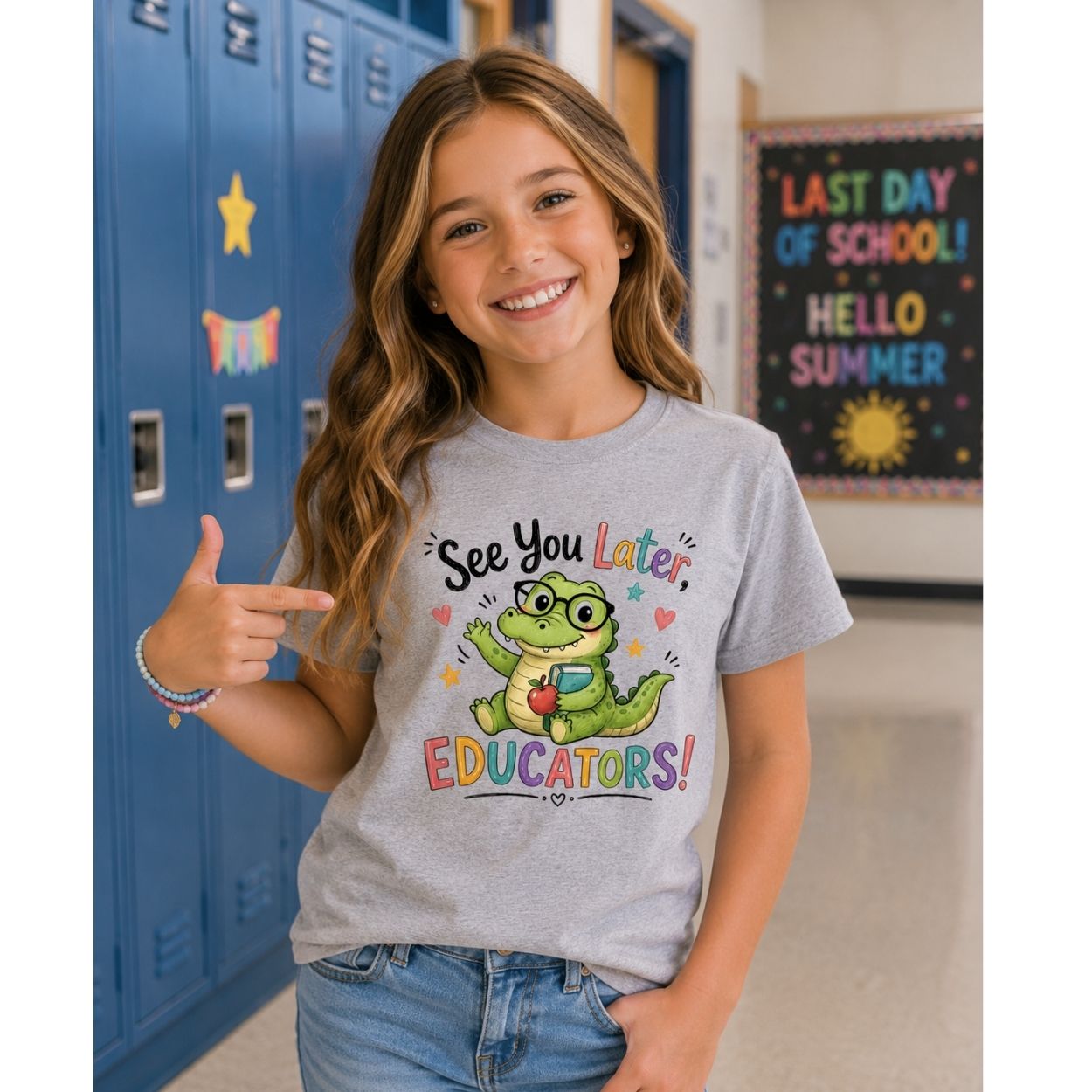 Young girl in a classroom wearing a t-shirt "See you later educators" with alligator on front for last day of school.