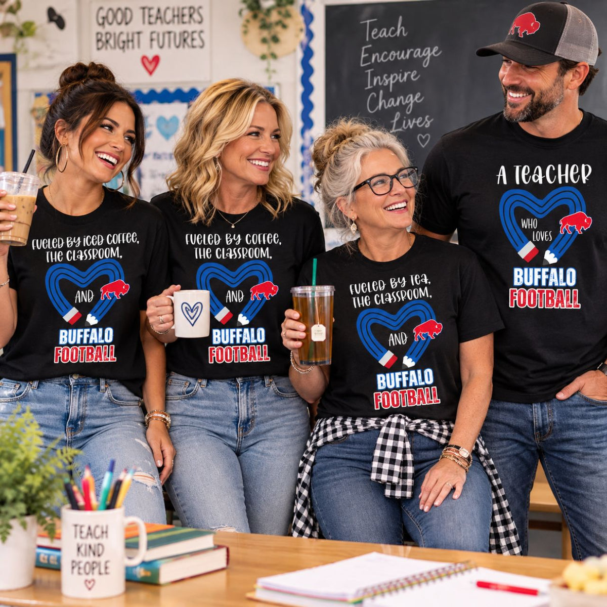 Group of teachers in a classroom wearing black Buffalo Football shirts.