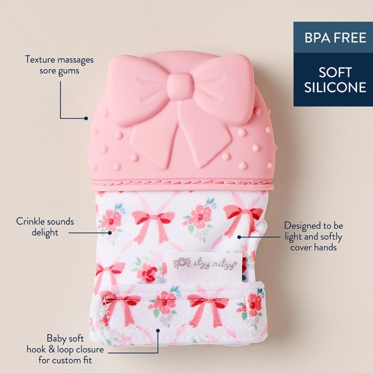 Itzy Mitt wearable pink bow silicone teething mitt teether with details of soft silicone and textured glove.