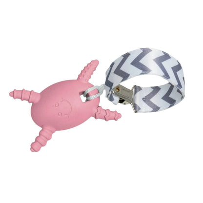 Pink molar magician baby teether with a gray and white chevron-patterned strap on a white background