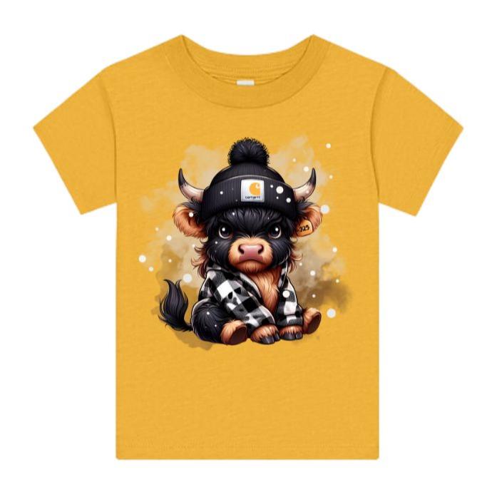 Golden yellow toddler tshirt with black grown highland cow in flannel and beanie hat on front. Shirt sitting on white background.  Little Gift Nook