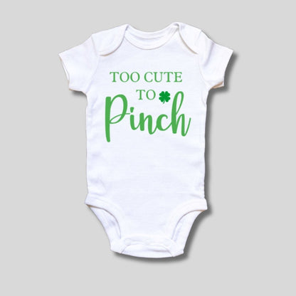 Too Cute to Pinch St. Patty's white bodysuit with green lettering on front and little clover.  Little Gift Nook.